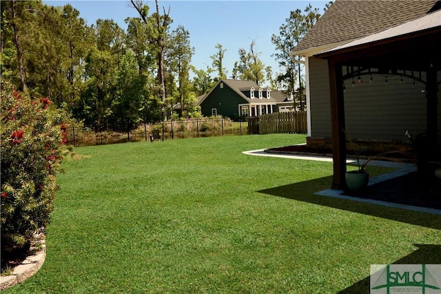 view of yard with fence