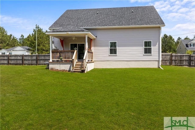 40 Saddlebrush Rd, Ellabell, GA 31308 - rear view of house featuring a fenced backyard, a wooden deck, a lawn, and ceiling fan