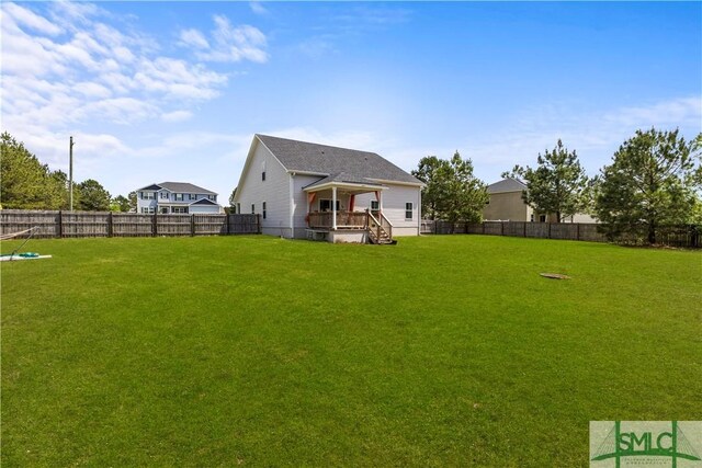 40 Saddlebrush Rd, Ellabell, GA 31308 - view of yard with a deck and a fenced backyard