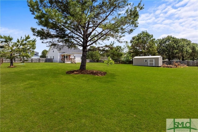 40 Saddlebrush Rd, Ellabell, GA 31308 - view of yard featuring an outbuilding, a fenced backyard, and a shed