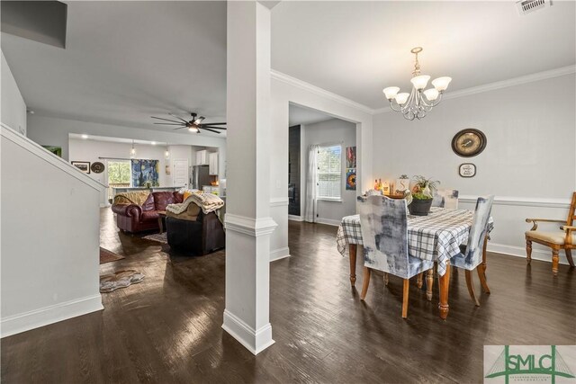 40 Saddlebrush Rd, Ellabell, GA 31308 - dining space with visible vents, ceiling fan with notable chandelier, ornamental molding, and wood finished floors
