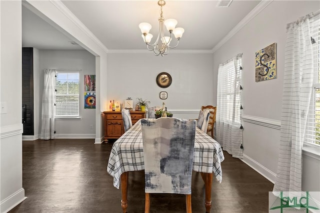 40 Saddlebrush Rd, Ellabell, GA 31308 - dining area with crown molding, baseboards, a notable chandelier, and dark wood-style flooring