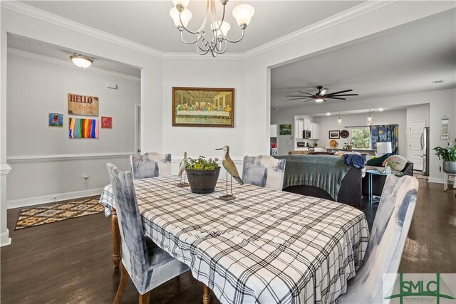 40 Saddlebrush Rd, Ellabell, GA 31308 - dining space with dark wood-type flooring, ornamental molding, baseboards, and ceiling fan with notable chandelier