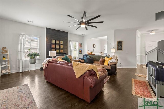 40 Saddlebrush Rd, Ellabell, GA 31308 - living area featuring visible vents, ceiling fan, plenty of natural light, and dark wood-style floors