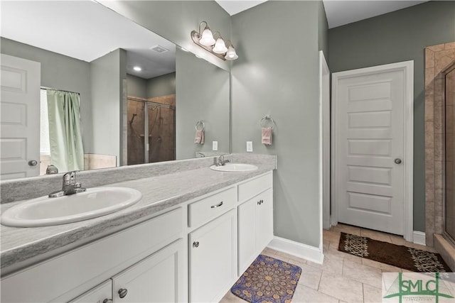 40 Saddlebrush Rd, Ellabell, GA 31308 - bathroom with a sink, baseboards, double vanity, and a stall shower