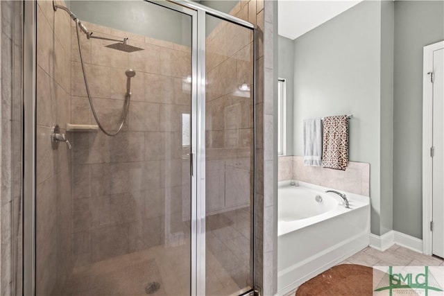 40 Saddlebrush Rd, Ellabell, GA 31308 - bathroom with tile patterned floors, a bath, a stall shower, and baseboards