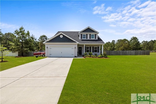 40 Saddlebrush Rd, Ellabell, GA 31308 - craftsman house featuring concrete driveway, a front yard, fence, and a garage