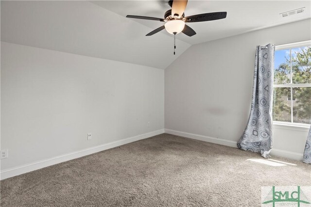 40 Saddlebrush Rd, Ellabell, GA 31308 - carpeted spare room featuring ceiling fan, baseboards, lofted ceiling, and visible vents