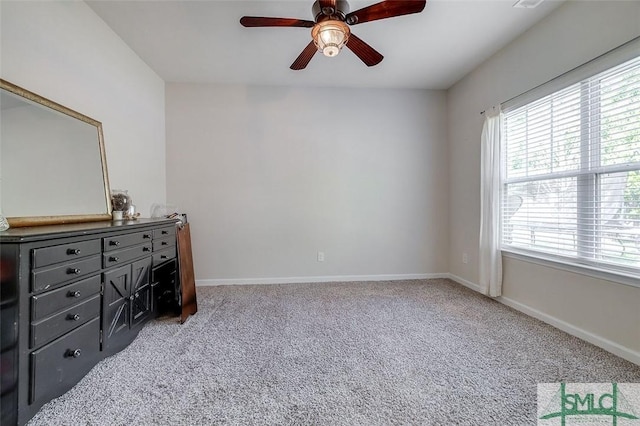 106 Cedar Ridge Dr, Guyton, GA 31312 - unfurnished bedroom featuring carpet flooring, multiple windows, and baseboards