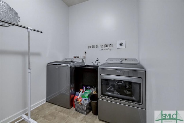 106 Cedar Ridge Dr, Guyton, GA 31312 - laundry area with independent washer and dryer and baseboards