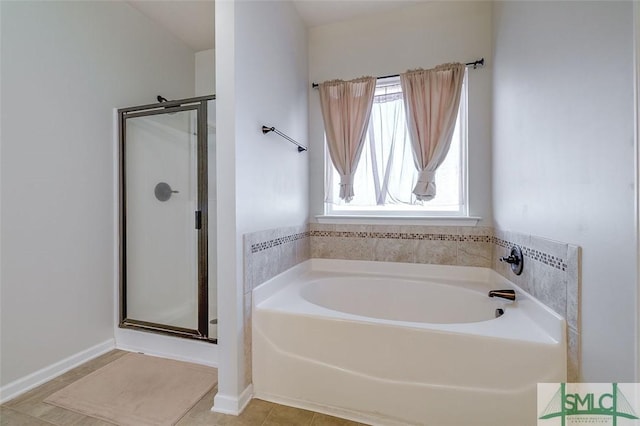 106 Cedar Ridge Dr, Guyton, GA 31312 - bathroom featuring a stall shower, a garden tub, and tile patterned floors