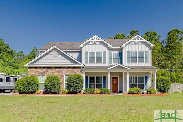 106 Cedar Ridge Dr, Guyton, GA 31312 - view of front of property with stone siding and board and batten siding