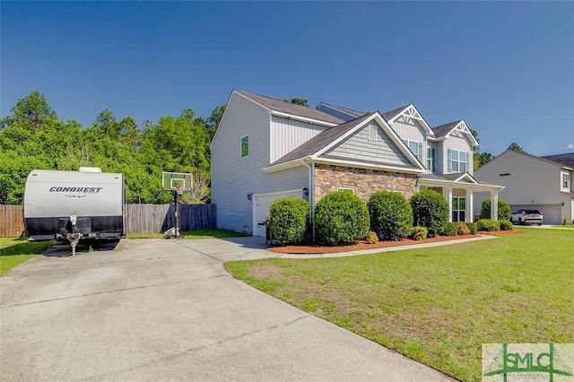 106 Cedar Ridge Dr, Guyton, GA 31312 - craftsman-style home with stone siding and concrete driveway