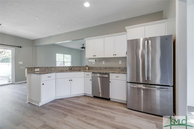 106 Cedar Ridge Dr, Guyton, GA 31312 - kitchen featuring stainless steel appliances, light wood-type flooring, white cabinetry, and recessed lighting
