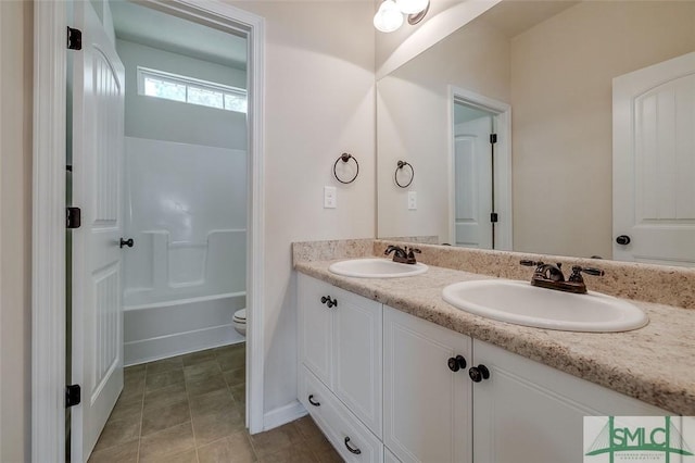 106 Cedar Ridge Dr, Guyton, GA 31312 - bathroom with double vanity, toilet, and shower / washtub combination