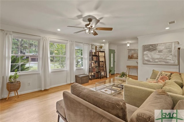 living room with recessed lighting, light wood-style floors, a ceiling fan, visible vents, and baseboards