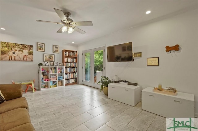 living area featuring recessed lighting, a ceiling fan, and french doors