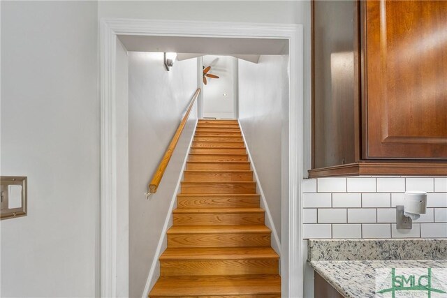 229 Golden Dr, Rincon, GA 31326 - staircase with ceiling fan