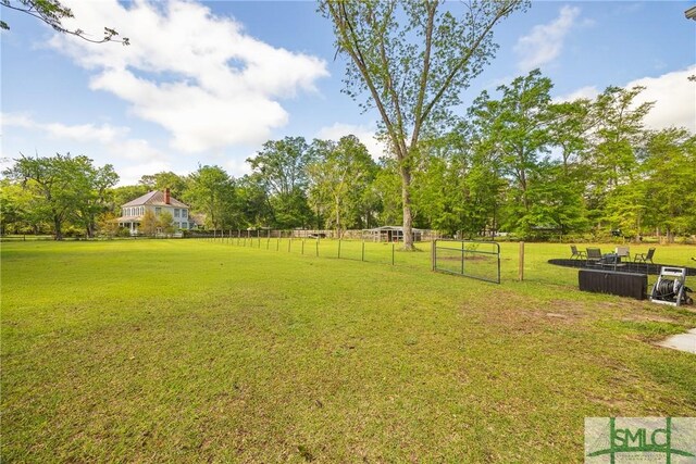 229 Golden Dr, Rincon, GA 31326 - view of yard featuring fence