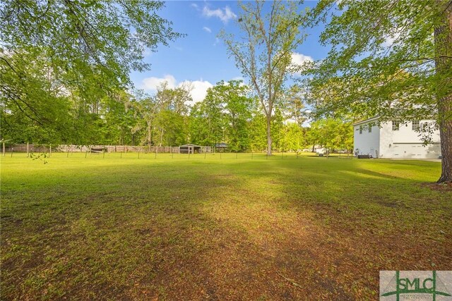 229 Golden Dr, Rincon, GA 31326 - view of yard with fence