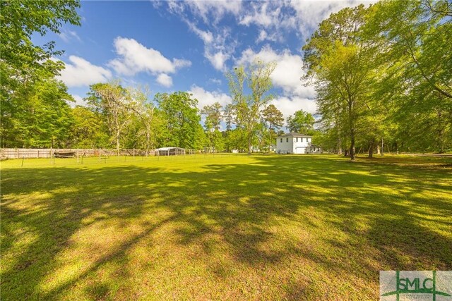 229 Golden Dr, Rincon, GA 31326 - view of yard featuring fence