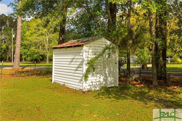 229 Golden Dr, Rincon, GA 31326 - view of shed with fence
