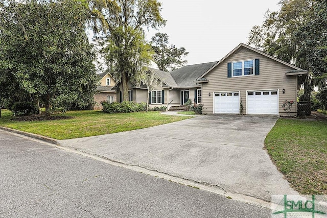 view of front of house featuring a garage, driveway, and a front lawn