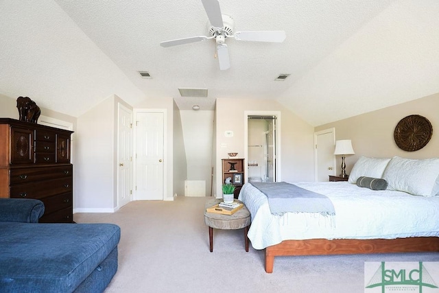 bedroom featuring carpet, ceiling fan, vaulted ceiling, and visible vents