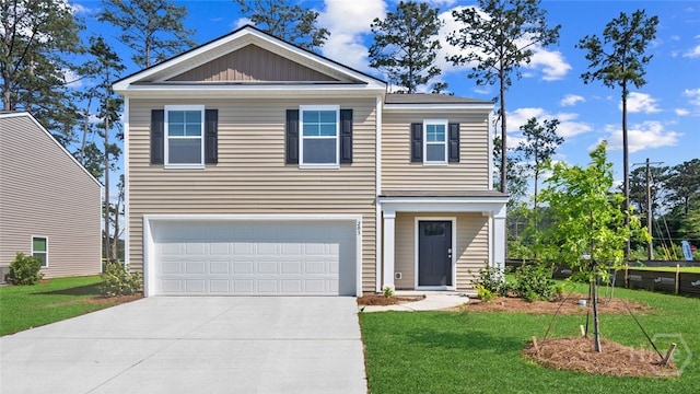 203 Ellie Way, Savannah, GA 31419 - view of front facade with driveway, a garage, and a front yard