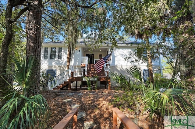 116 Brevard Ct, Savannah, GA 31410 - view of front of home with stucco siding and stairway