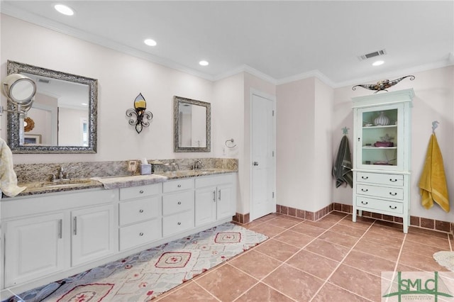 116 Brevard Ct, Savannah, GA 31410 - bathroom featuring double vanity, ornamental molding, a closet, tile patterned flooring, and recessed lighting