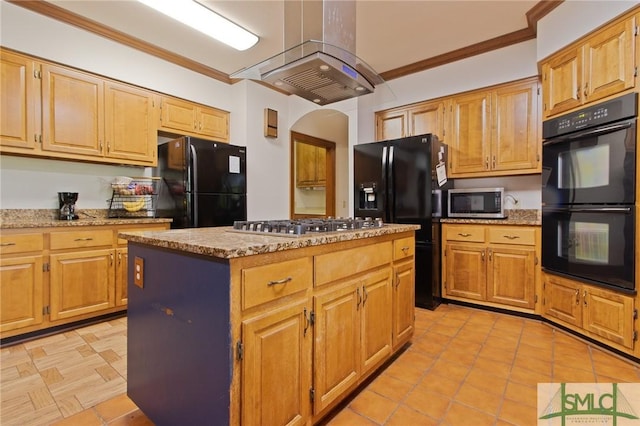 kitchen with a center island, crown molding, light stone countertops, island range hood, and black appliances