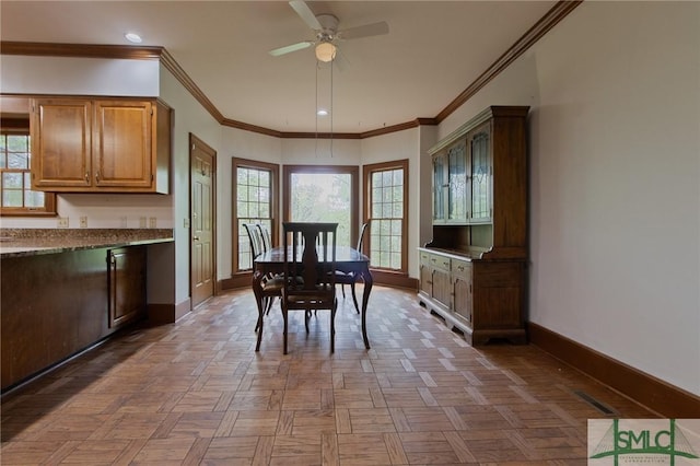 dining room with ornamental molding, a ceiling fan, visible vents, recessed lighting, and baseboards