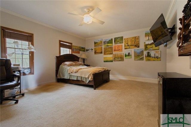bedroom with baseboards, ornamental molding, and carpet floors
