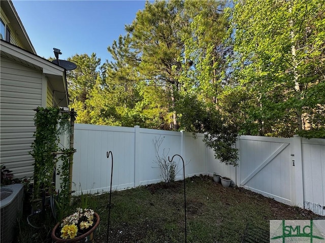 226 Ventura Pl, Pooler, GA 31322 - fenced backyard with a gate and central AC unit