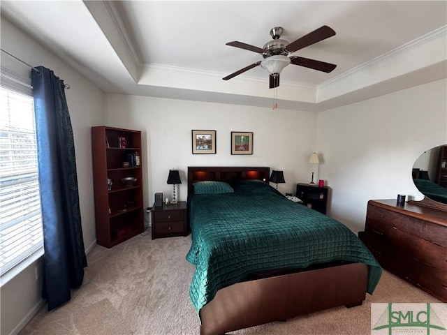 226 Ventura Pl, Pooler, GA 31322 - bedroom with light colored carpet, crown molding, a tray ceiling, and a ceiling fan