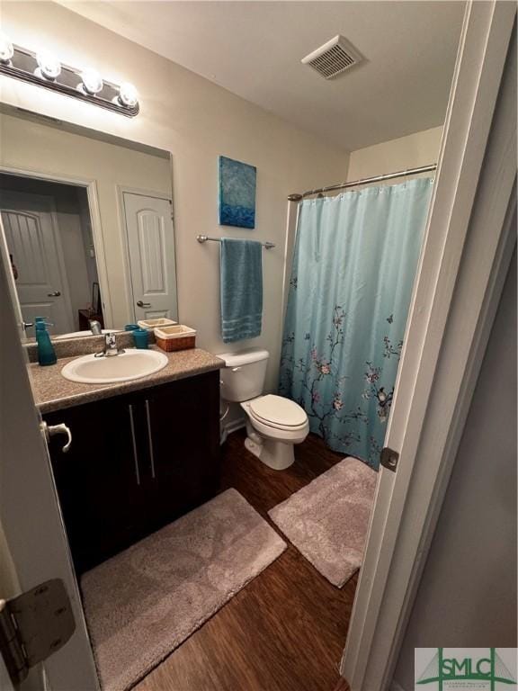 226 Ventura Pl, Pooler, GA 31322 - full bath with wood finished floors, toilet, vanity, and curtained shower