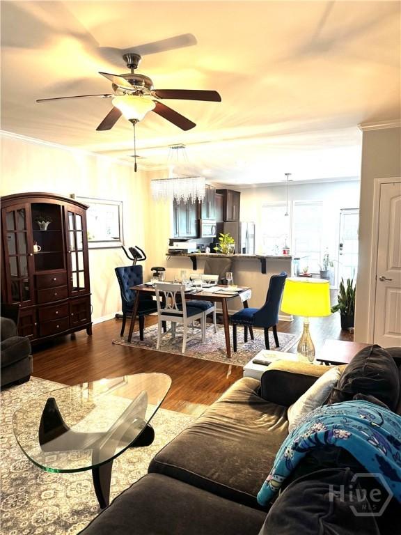 226 Ventura Pl, Pooler, GA 31322 - living room featuring ornamental molding, ceiling fan, and wood finished floors