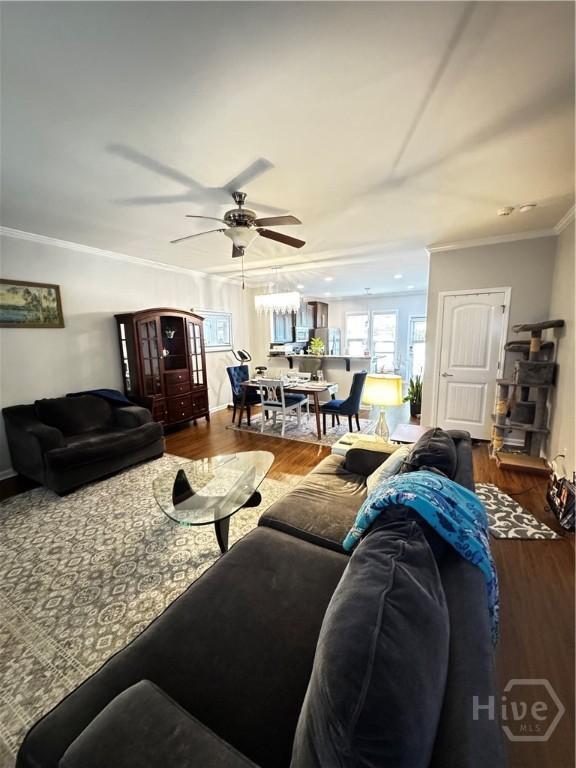 226 Ventura Pl, Pooler, GA 31322 - living area featuring wood finished floors, crown molding, and a ceiling fan