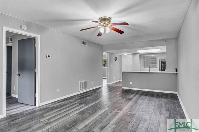 12510 White Bluff Rd Unit 1406, Savannah, GA 31419 - unfurnished living room featuring dark wood-type flooring, visible vents, and a ceiling fan