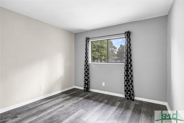 12510 White Bluff Rd Unit 1406, Savannah, GA 31419 - spare room with baseboards and wood finished floors