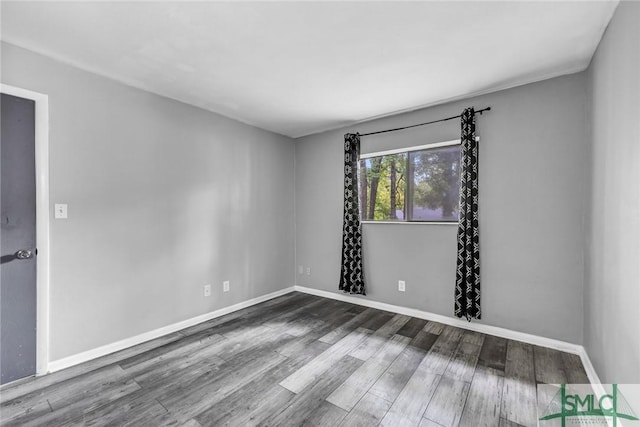 12510 White Bluff Rd Unit 1406, Savannah, GA 31419 - unfurnished room with wood finished floors and baseboards