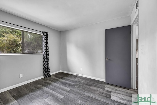 12510 White Bluff Rd Unit 1406, Savannah, GA 31419 - unfurnished room featuring wood finished floors and baseboards