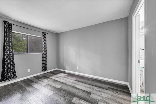12510 White Bluff Rd Unit 1406, Savannah, GA 31419 - empty room featuring baseboards and wood finished floors