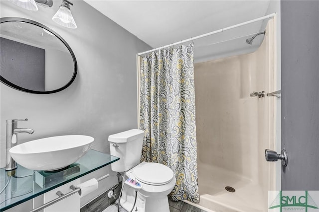 12510 White Bluff Rd Unit 1406, Savannah, GA 31419 - bathroom with toilet, a stall shower, and vanity