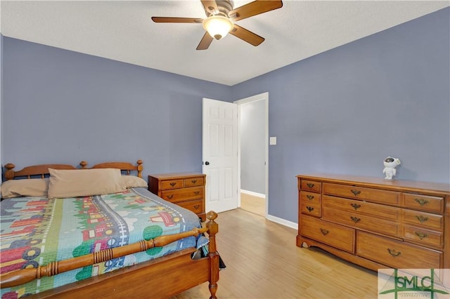 5 Wigmore Cir, Savannah, GA 31410 - bedroom featuring light wood-style flooring, a ceiling fan, and baseboards