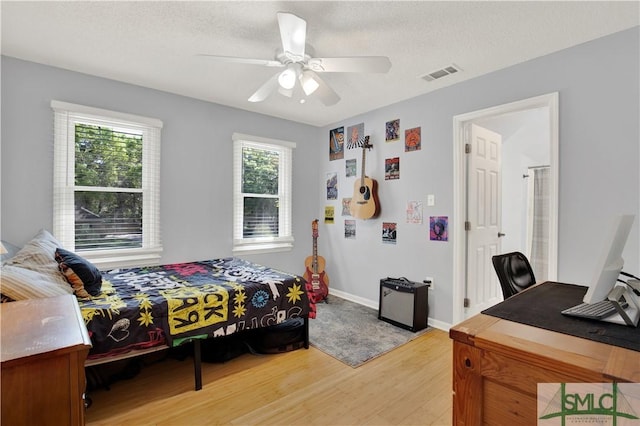 5 Wigmore Cir, Savannah, GA 31410 - bedroom featuring visible vents, ceiling fan, light wood-style floors, and baseboards