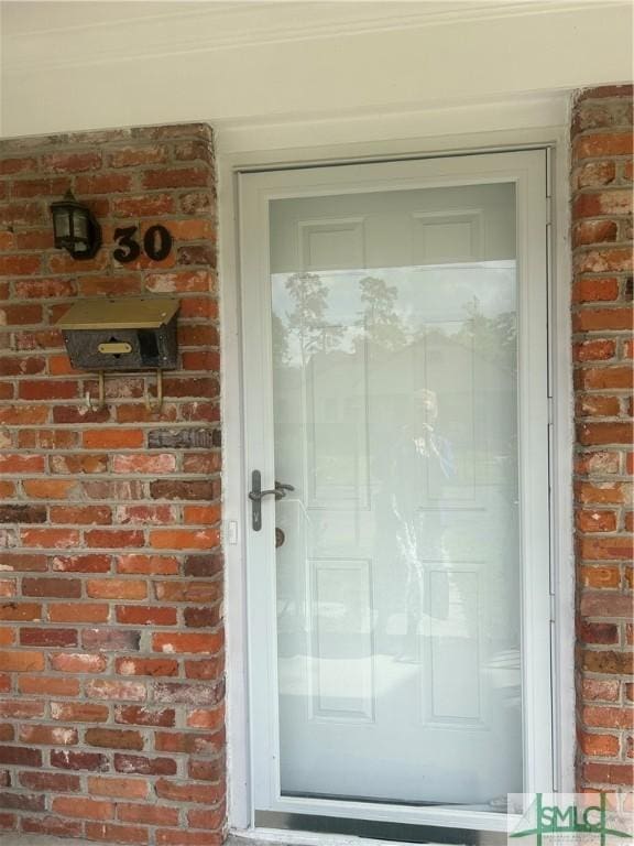 30 Lawton Ave, Savannah, GA 31404 - property entrance featuring brick siding