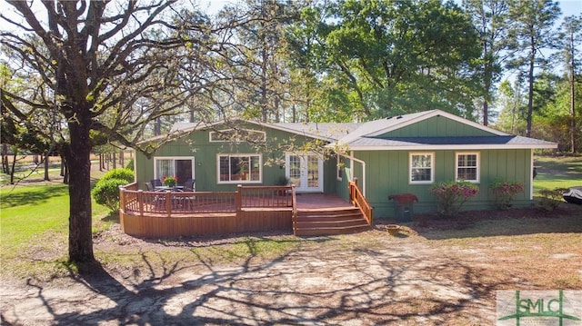 3411 Ponderosa Rd, Portal, GA 30450 - rear view of house with french doors and a deck