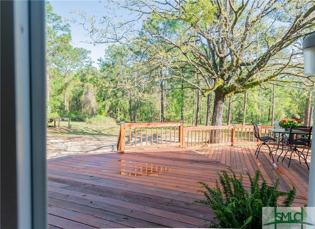 3411 Ponderosa Rd, Portal, GA 30450 - wooden deck with outdoor dining area